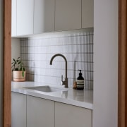 A finger tile splashback brings texture and visual 