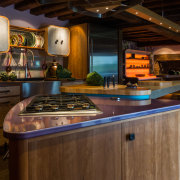 No space should be wasted, circulation around the building, cabinetry, countertop, furniture, home, interior design, kitchen, lighting, property, room, under-cabinet lighting, black, brown