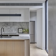 The floor-to-ceiling concealed door to the butler's pantry. 