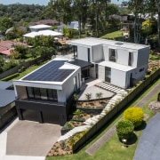 Aerial view of the transformed home. - A 