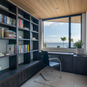 Lake facing study with built in bookcase and 