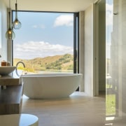 In this master ensuite blessed with spectacular views, gray