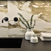 The laundry splashback's Macchia Vecchia 600x1200mm is a 