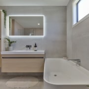 Both bathroom and ensuite have Ferrocemento Bianco 597x1196mm 