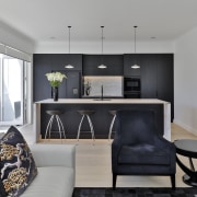 The existing Burr Elm Kitchen cabinetry including black 