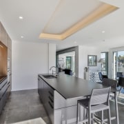 The benchtop overhang creates a handy breakfast bar. 