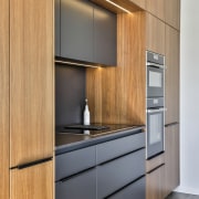 Rear cabinetry wall. - In step with the 