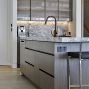 Handleless cabinetry ensures nothing detracts from the kitchen's 