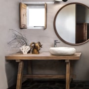 A custom-made poplar vanity and shutters were added 