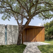 While the buildings are decidedly contemporary, the materials architecture, building, facade, grass, home, house, landscape, plant, property, real estate, residential area, tree, wood, woody plant, brown