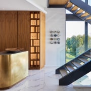 The stairs afford views to the mountainscape behind architecture, building, ceiling, design, floor, flooring, furniture, home, house, interior design, material property, property, real estate, room, stairs, tile, wall, wood, brown