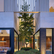 A landscape courtyard pushes into the home. 