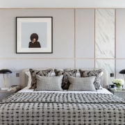 The master bedroom sports, soft, pebble-like tones. "We used 