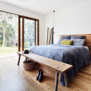 The bedroom opens right out onto the lawn architecture, bed, bed frame, bedroom, floor, flooring, furniture, hardwood, home, house, interior design, laminate flooring, real estate, wood, wood flooring, white