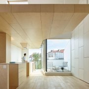 The two architects suggested to install the upper architecture, ceiling, daylighting, floor, flooring, house, interior design, wall, wood flooring, gray, brown