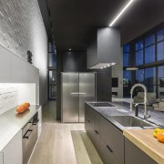 This form was brought into the kitchen by countertop, interior design, kitchen, gray, black