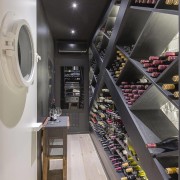 An elegant impressive wine storage area. - Robin interior design, gray, black