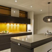 JAG Kitchens - Earth, fire, water and air cabinetry, countertop, interior design, kitchen, lighting, under cabinet lighting, brown, black