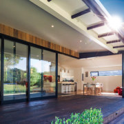 This image demonstrates the indoor-outdoor flow - Waitoki architecture, ceiling, condominium, daylighting, estate, home, house, interior design, lobby, property, real estate, window, gray