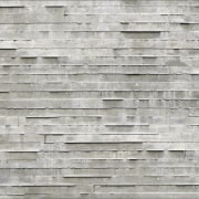 The layered concrete wall certainly reflects the 'Two brick, brickwork, plank, stone wall, texture, wall, wood, gray