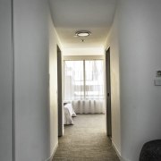 Curved walls invite you into the bedroom - architecture, ceiling, daylighting, floor, flooring, home, house, interior design, real estate, wall, gray