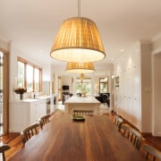 TIDA NZ 2017 – Designer kitchen entrant – ceiling, chandelier, dining room, floor, flooring, hardwood, interior design, laminate flooring, light fixture, lighting, living room, table, wood, wood flooring, orange, brown