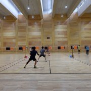 There's ample for multiple games - There's ample competition event, flooring, fun, leisure, leisure centre, sport venue, sports, structure, gray, brown