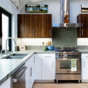 The kitchen features ample work space and an cabinetry, countertop, cuisine classique, floor, interior design, kitchen, gray