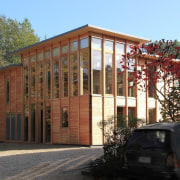 There's almost an eastern influence to the home architecture, building, facade, home, house, property, real estate, residential area, roof, shed, window, black