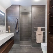 Even a simple, high quality towel rail can bathroom, floor, flooring, interior design, room, tile, gray, black