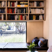 This bookshelf is compact and packed in above bookcase, furniture, home, interior design, living room, shelf, shelving