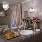 An expansive mirror certainly makes the room feel bathroom, ceiling, countertop, dining room, home, interior design, kitchen, room, sink, gray