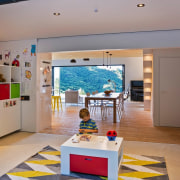 This living area is perfect for young children. exhibition, interior design, gray