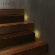 Watch your step – hidden lights face the floor, flooring, hardwood, interior design, laminate flooring, light, lighting, stairs, wall, wood, wood flooring, wood stain, brown, black