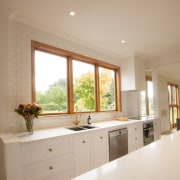 TIDA NZ 2017 – Designer kitchen entrant – cabinetry, ceiling, countertop, daylighting, floor, flooring, home, house, interior design, kitchen, real estate, room, sink, window, gray, brown