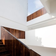 A wood stairway – including the balustrade – architecture, ceiling, daylighting, house, interior design, product design, property, wood, white