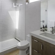 Another bathroom, this one featuring soft whites and architecture, bathroom, bathroom accessory, bathroom cabinet, bathroom sink, floor, home, interior design, plumbing fixture, product design, room, sink, tap, tile, wall, gray