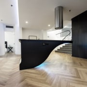 This floating island seems impossible – but it's architecture, countertop, floor, flooring, hardwood, interior design, laminate flooring, loft, product design, tile, wood, wood flooring, gray