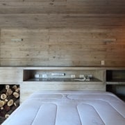 A fireplace, ample shelving for books and space architecture, floor, house, interior design, wall, gray, black