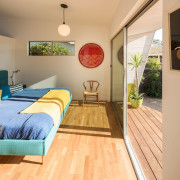 Architect: Surfside ProjectsPhotography by Darren Bradley bedroom, ceiling, floor, flooring, hardwood, home, house, interior design, laminate flooring, property, real estate, room, wall, window, wood, wood flooring, orange