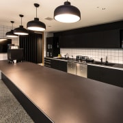 Each level of the office leasing space at countertop, flooring, interior design, kitchen, gray, black