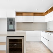 Storage runs along the top of this kitchen, cabinetry, countertop, cuisine classique, floor, home appliance, interior design, kitchen, kitchen appliance, kitchen stove, major appliance, product design, room, wood flooring, white