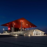 The roof is suspended high above the amphitheatre architecture, building, corporate headquarters, evening, fixed link, lighting, opera house, sky, structure, tourist attraction, blue, black