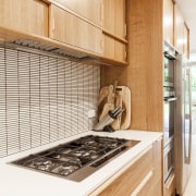 Wood cabinetry gives the kitchen a sustainable look cabinetry, countertop, cuisine classique, interior design, kitchen, room, white, orange