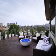 A rooftop deck is the perfect place to apartment, balcony, home, outdoor structure, penthouse apartment, property, real estate, resort, roof, white, black