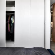 Wardrobes and other storage areas have been cleverly closet, door, furniture, room, wardrobe, white