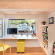 Architect: Surfside Projects. Photography by Darren Bradley building, ceiling, desk, floor, furniture, home, house, interior design, property, real estate, room, shelf, shelving, table, yellow, orange, gray