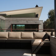 There's plenty of space for outdoor lounging - architecture, furniture, house, window, black
