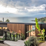 A gorgeous outlook to the ocean - A architecture, cottage, facade, home, house, outdoor structure, property, real estate, gray