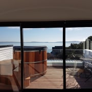 Read the story on the HomePlus website apartment, balcony, deck, house, outdoor structure, penthouse apartment, property, real estate, roof, window, black